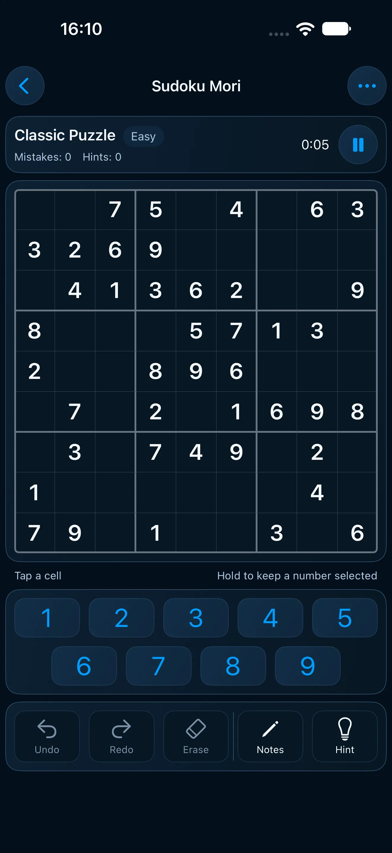 The same puzzle and controls in the dark theme, white digits and blue keys on a deep blue board.