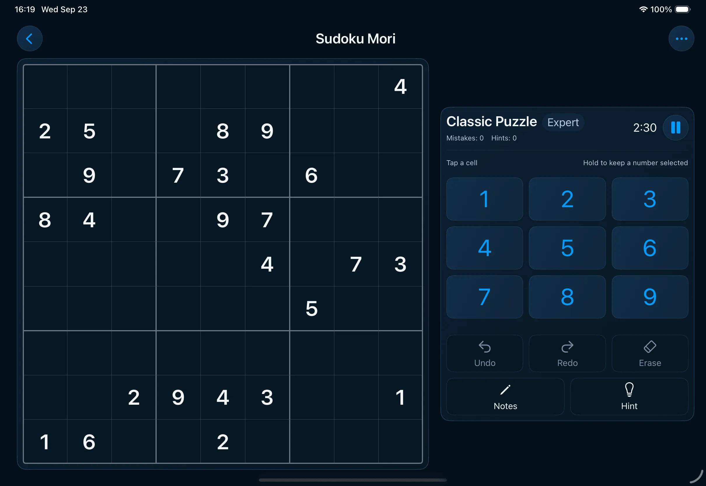 The right-handed iPad layout in the dark theme, the board on the left and the controls on the right, on a deep blue background.